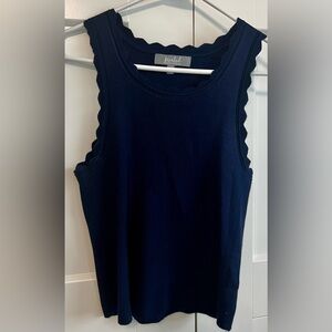 Navy knit with scalloped neckline and arm details